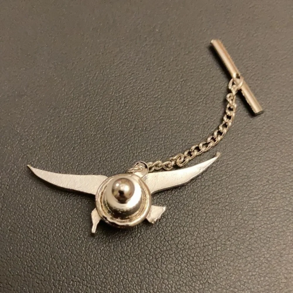 Silver tone tie tack